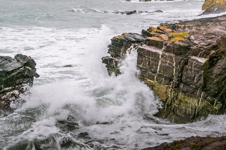 Waves crash on Dunworley
