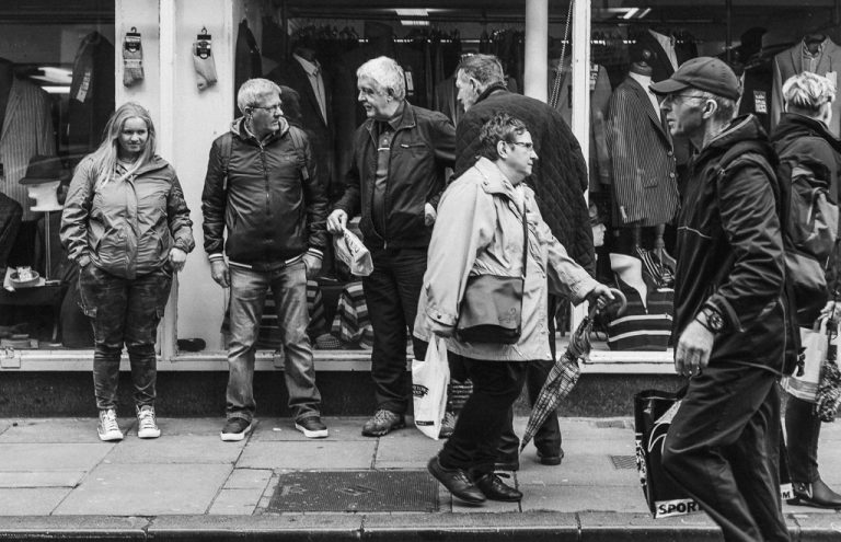 Chatting on a Busy Street