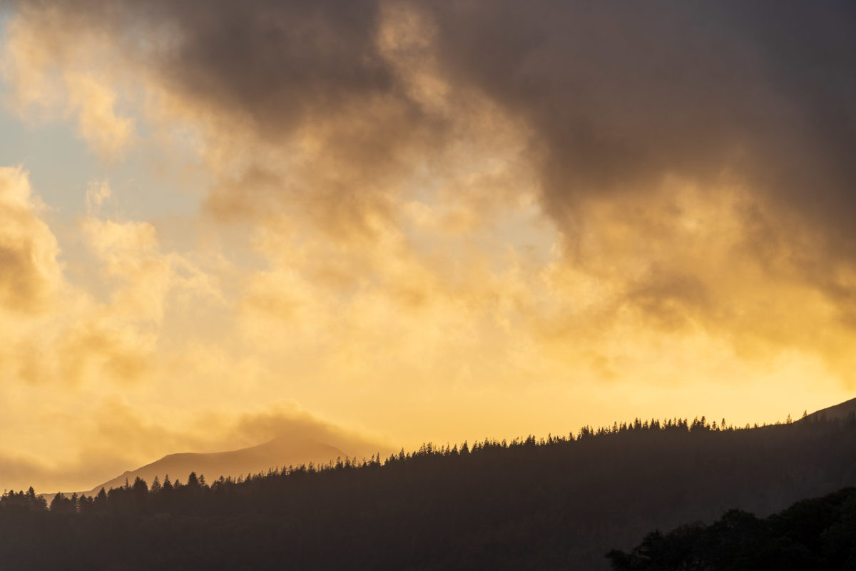 The sunrise flows over the hill