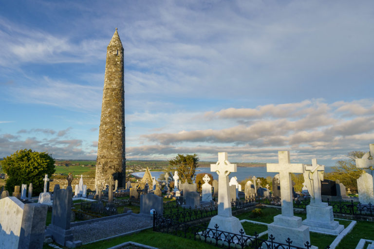 Sun sets on Ardmore Roundtower Graveyard