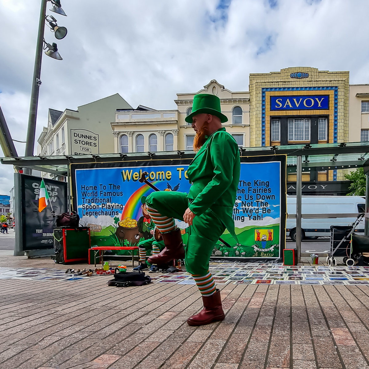 A leprechaun dancing on the street