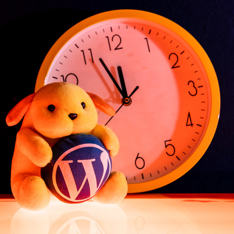 A WordPress Wapuu with a clock