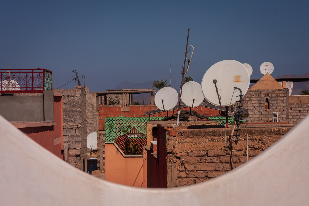 Satellite dishes like eyes on the sky on a roof in Morocco