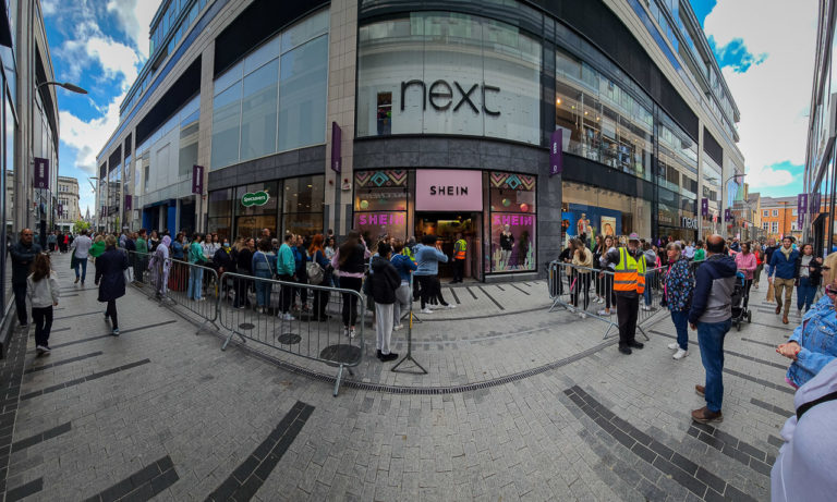 A popup "Shein" store opened in Opera Lane recently. There are long lines of people waiting to go in.