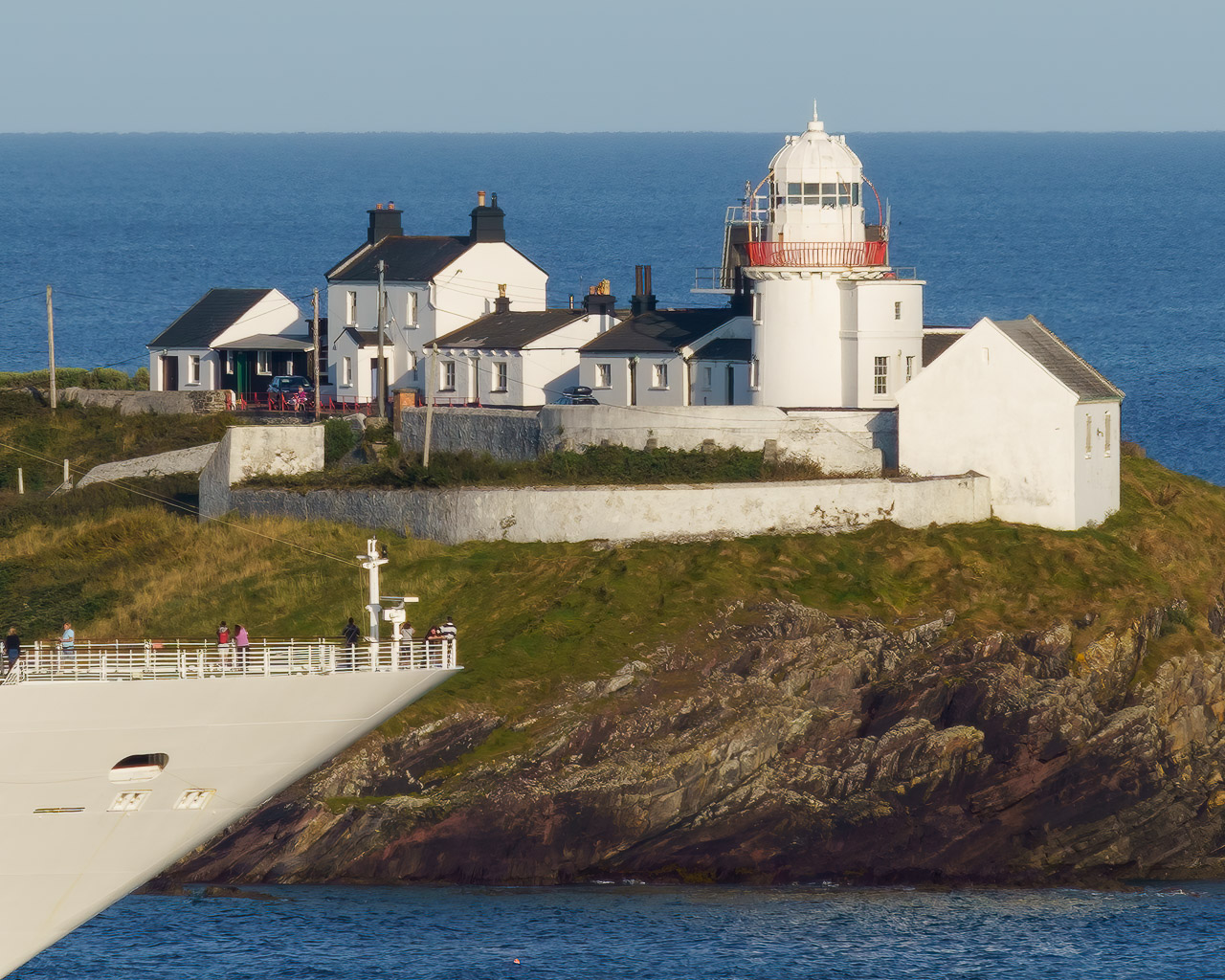 The bow of The Jewel of the Sea pictured passing Roches Point Lighthouse