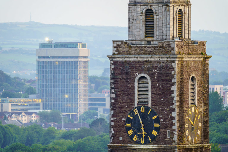 The tower of St. Anne's Church, or "Shandon Bells", with the County Hall in the background.