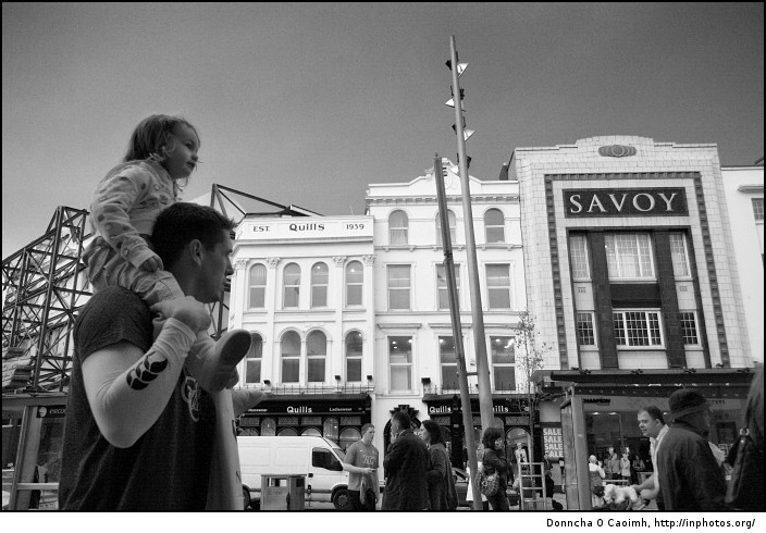 Girl on dad's shoulders
