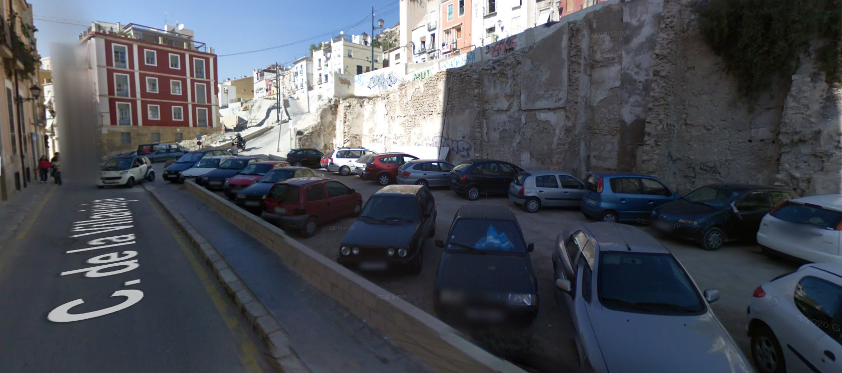 A street in Alicante, from Google Street View in 2008. Lots of cars in a car park.